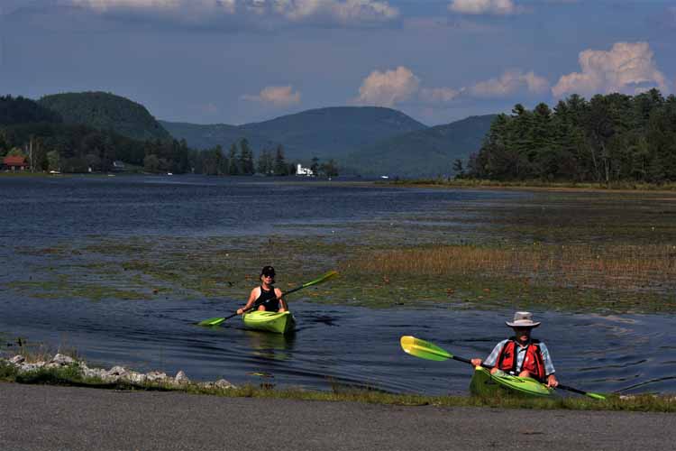 kayakers on lake